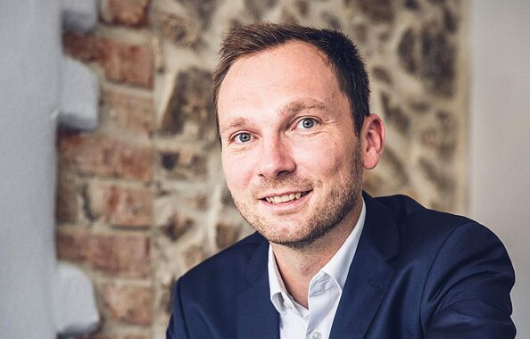 Vermittler und Regionaldirektor Toni Lorius