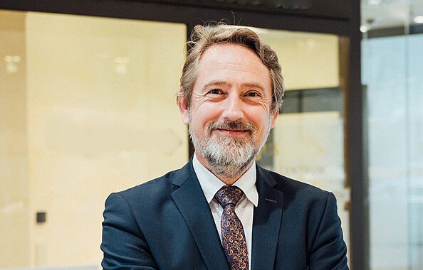 Vermittler und Regionaldirektor Christophe Lüttmann